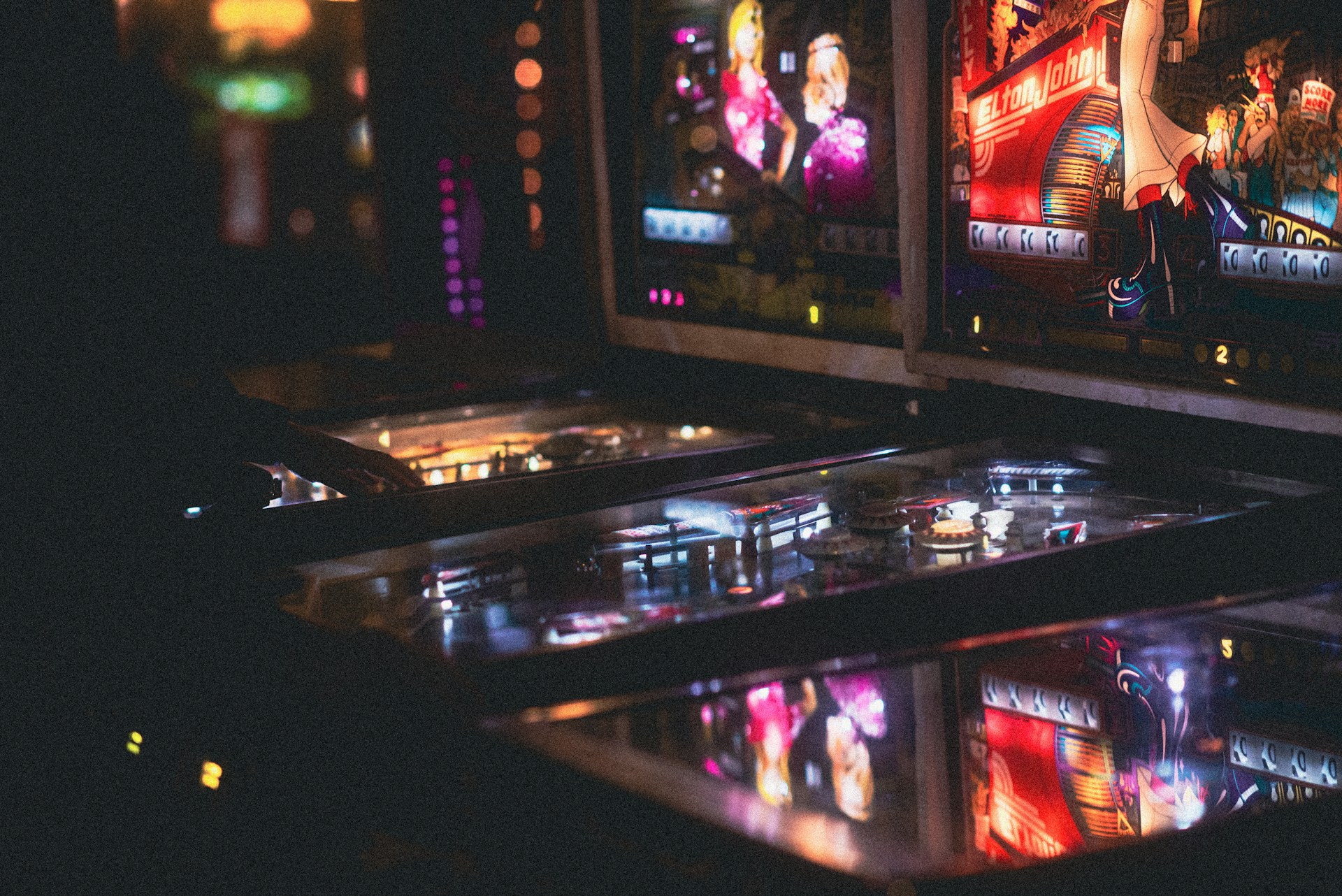 Smiling people playing on tablets